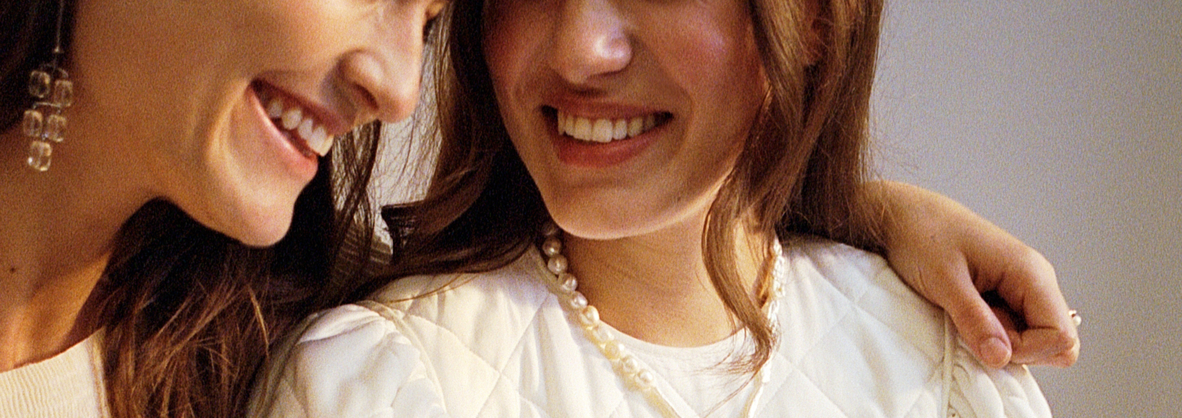 Two smiling women